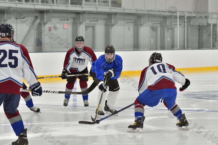 Wheaton College Men\'s Ice Hockey vs Middlesex Community College. - Photo By: KEITH NORDSTROM